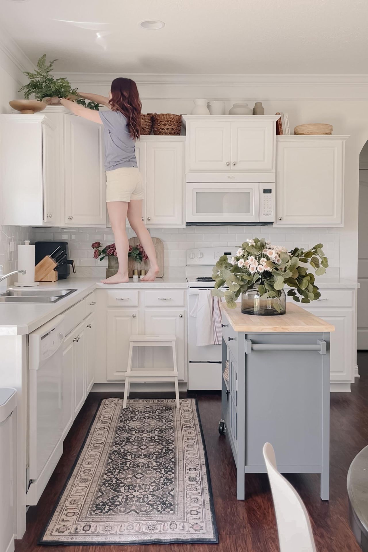 How to Decorate Above Kitchen Cabinets in  - Caitlin Marie Design