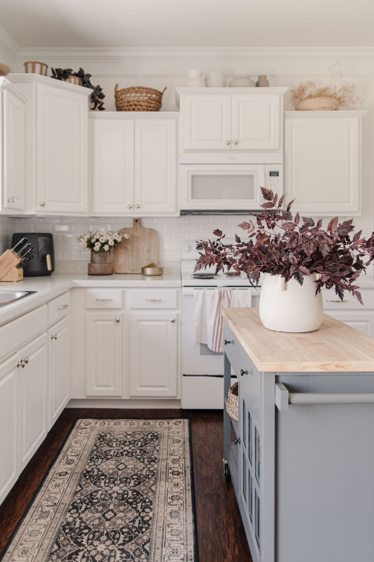 How to Decorate Above Kitchen Cabinets in  - Caitlin Marie Design